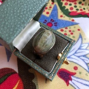 Silver and green serpentine stone ring.